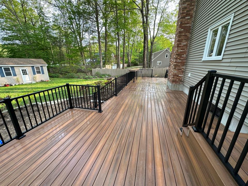 Multi-level backyard deck with wide composite stairs