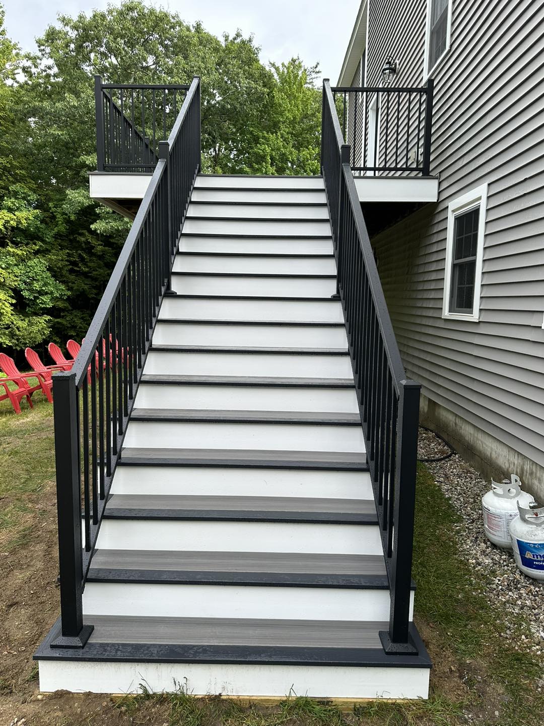 Pressure-treated deck framing and support posts before decking