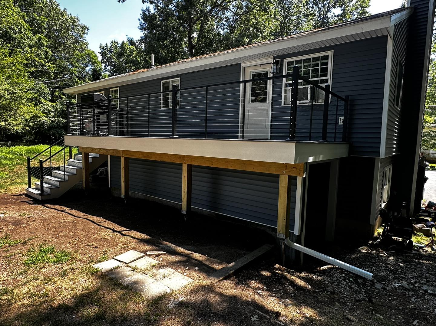 Long elevated deck with cable railing